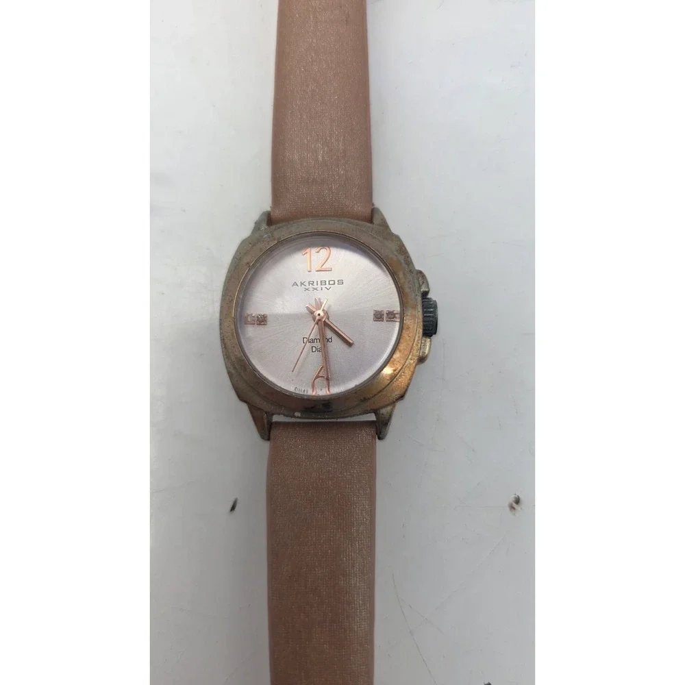 Akribos XXIV Women's AK742RG Lady Diamond Analog Display Swiss Quartz Champagne